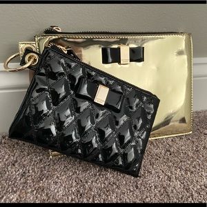 Victoria’s Secret black & gold pouch set